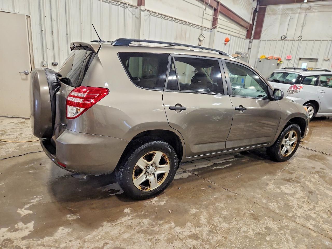 2010 Toyota Rav4 Base Brown vin: JTMBF4DV6AD027590