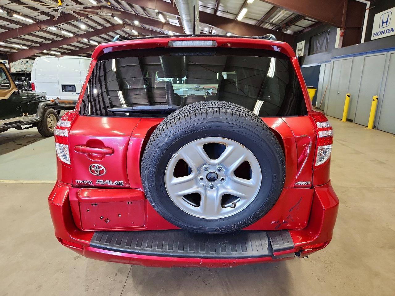 2010 Toyota Rav4 Base Red vin: JTMBF4DV6AD037598