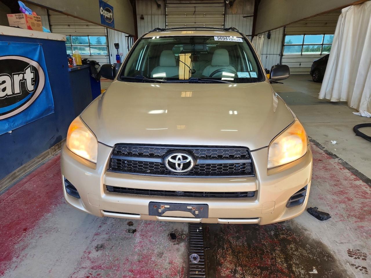 2012 Toyota Rav4 Base Gold vin: JTMBF4DV7CD043204