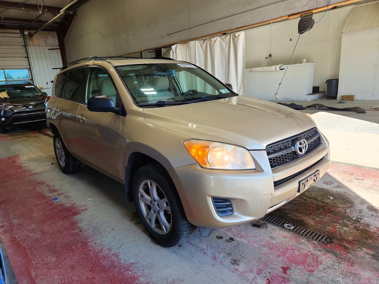 2012 Toyota Rav4 Base Gold vin: JTMBF4DV7CD043204