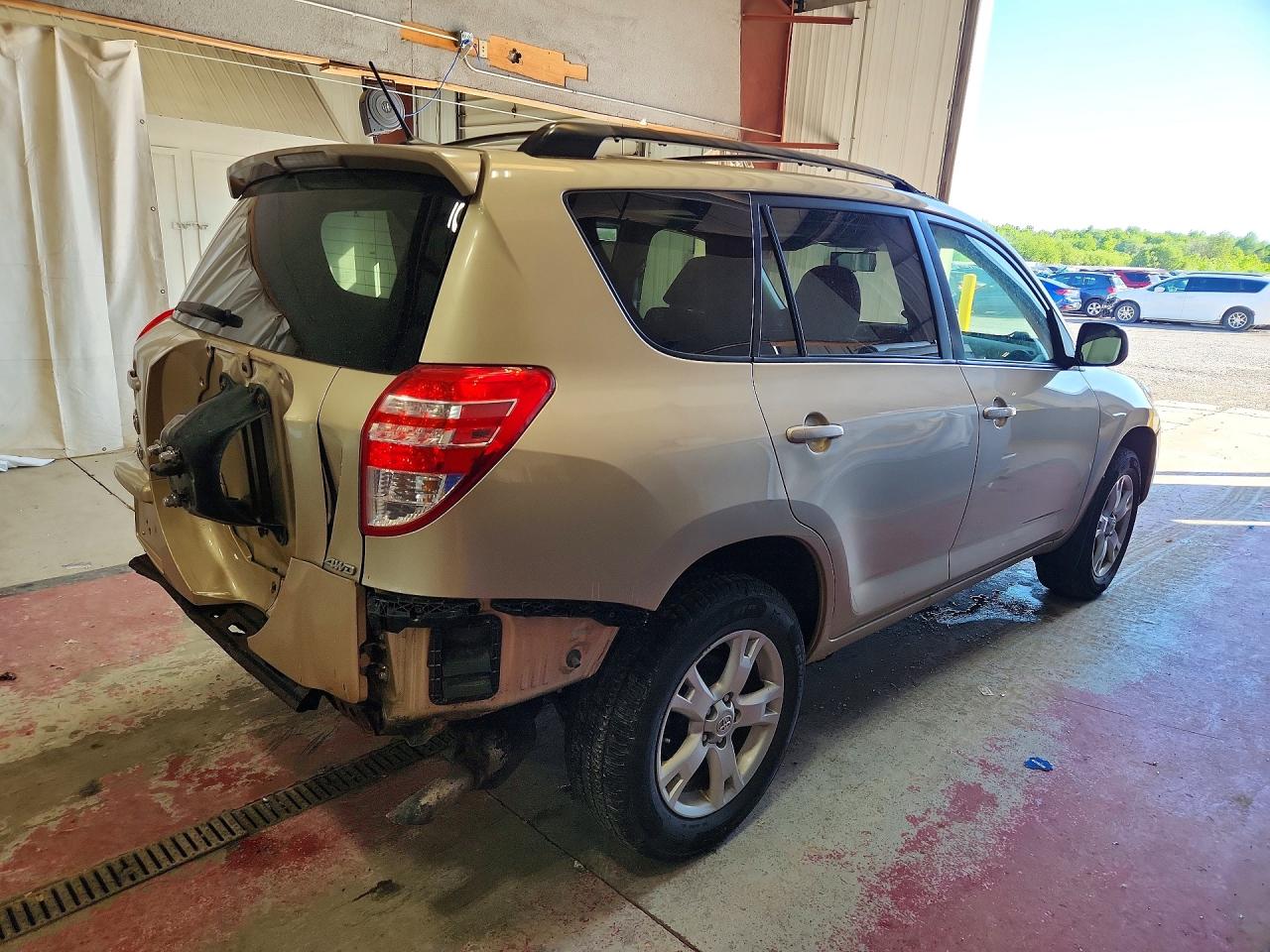 2012 Toyota Rav4 Base Gold vin: JTMBF4DV7CD043204