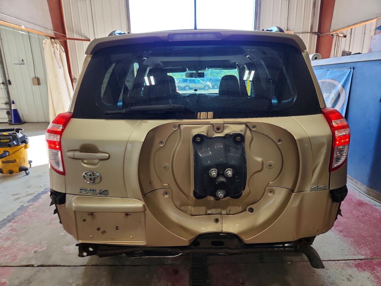 2012 Toyota Rav4 Base Gold vin: JTMBF4DV7CD043204