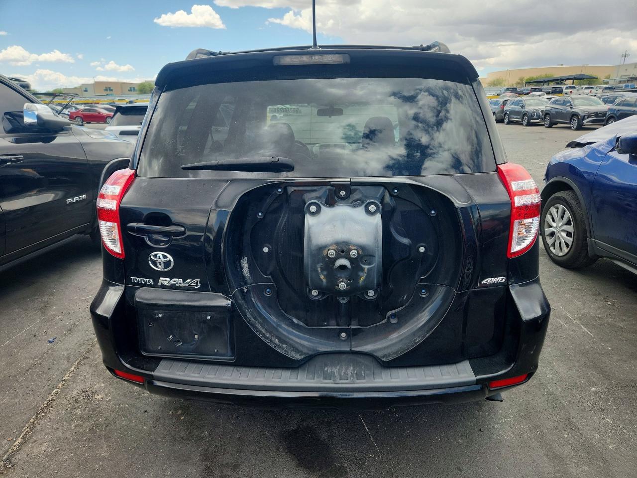 2010 Toyota Rav4 Base Black vin: JTMBF4DV8AD024528