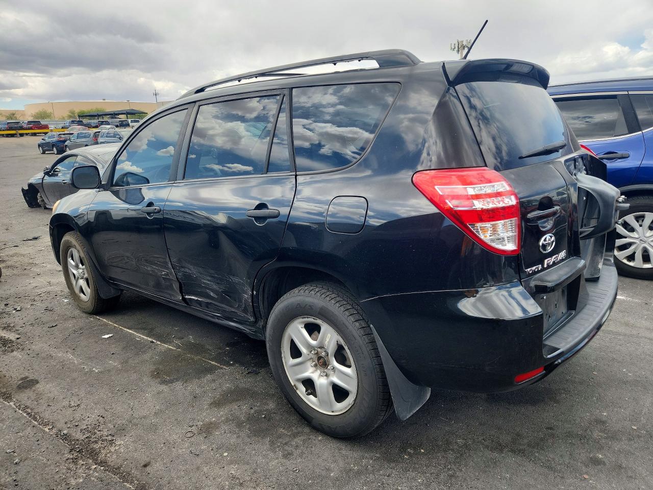 2010 Toyota Rav4 Base Black vin: JTMBF4DV8AD024528