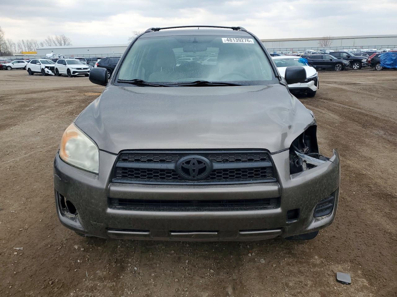2010 Toyota Rav4 Base Brown vin: JTMBF4DV9AD025848