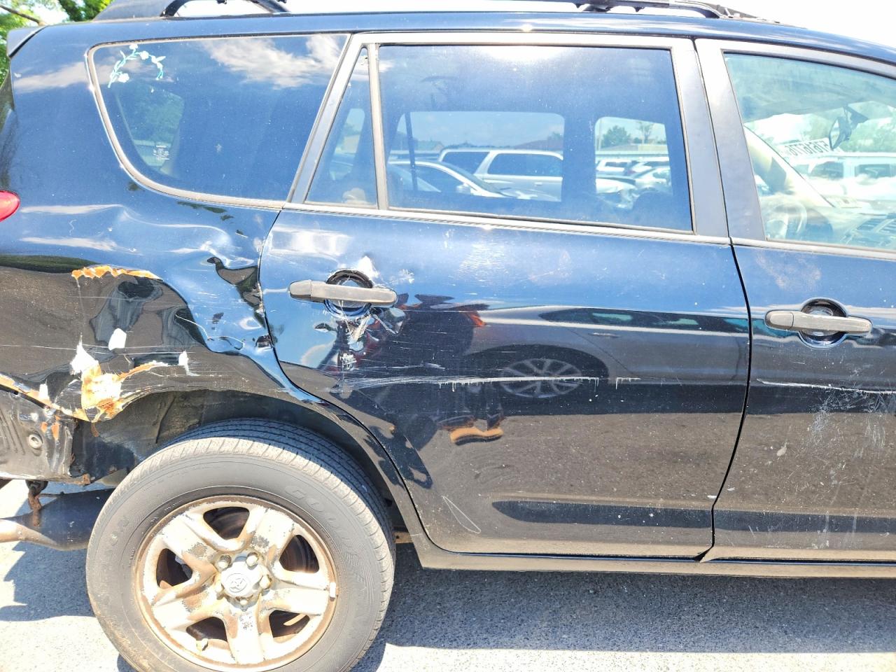 2010 Toyota Rav4 Base Black vin: JTMBF4DV9AD030175