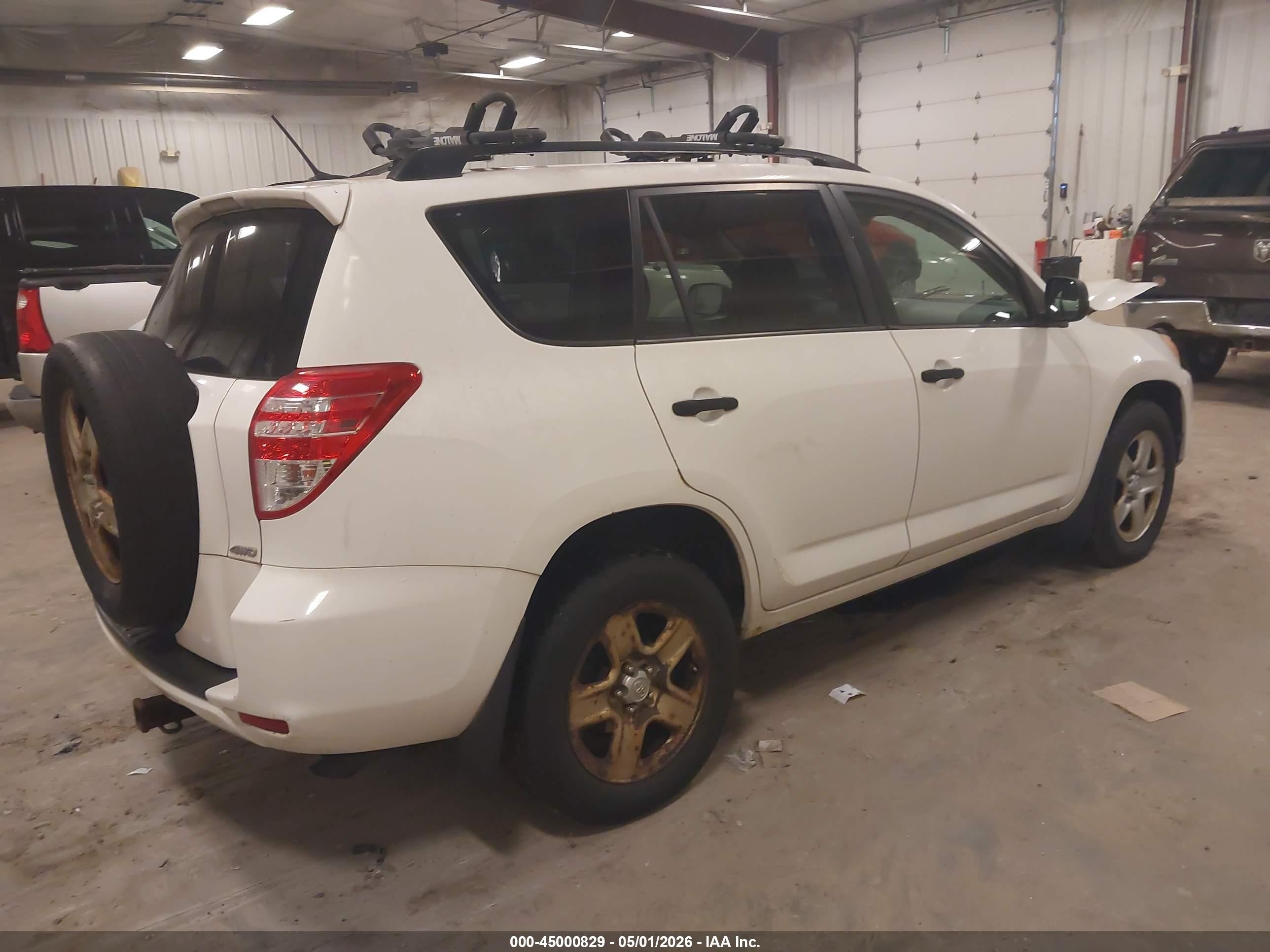 2010 Toyota Rav4   White vin: JTMBF4DVXAD027463