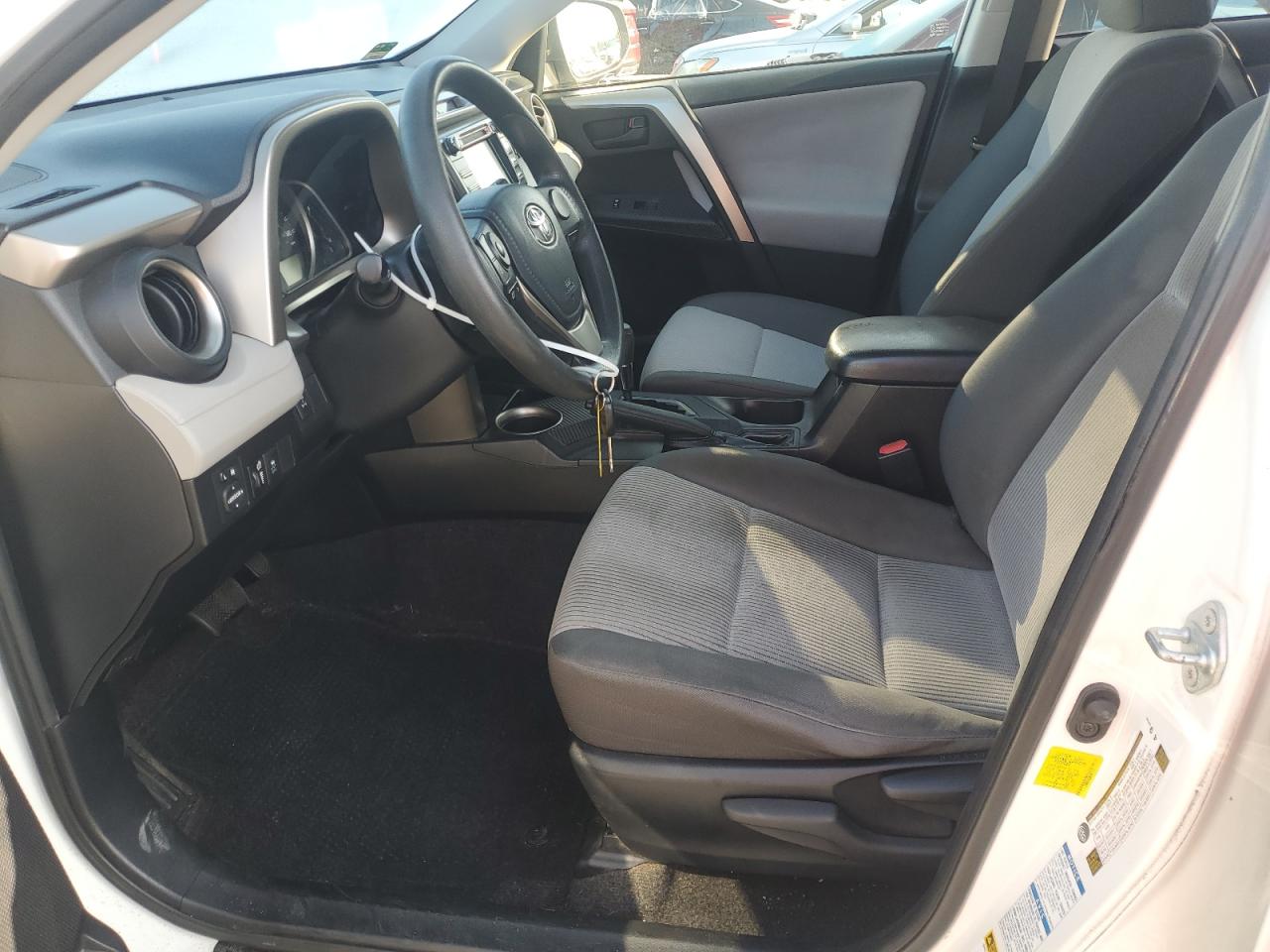 2014 Toyota Rav4 Le White vin: JTMBFREV0ED071117