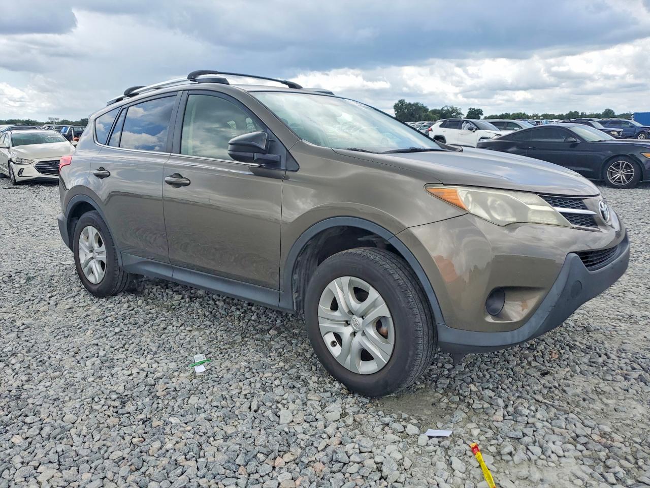 2014 Toyota Rav4 Le Brown vin: JTMBFREV2ED055470