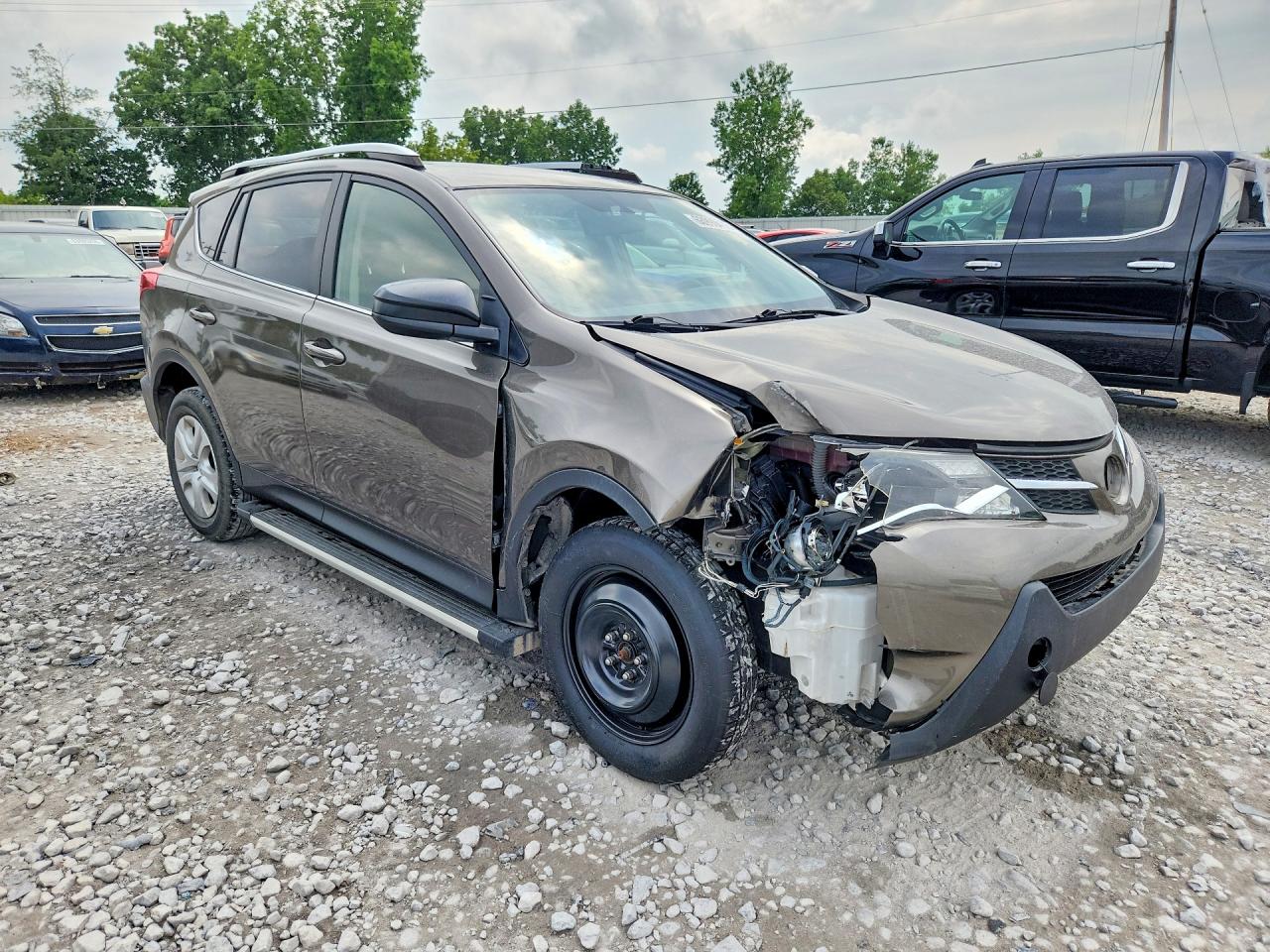 2015 Toyota Rav4 Le Brown vin: JTMBFREV2FD174959