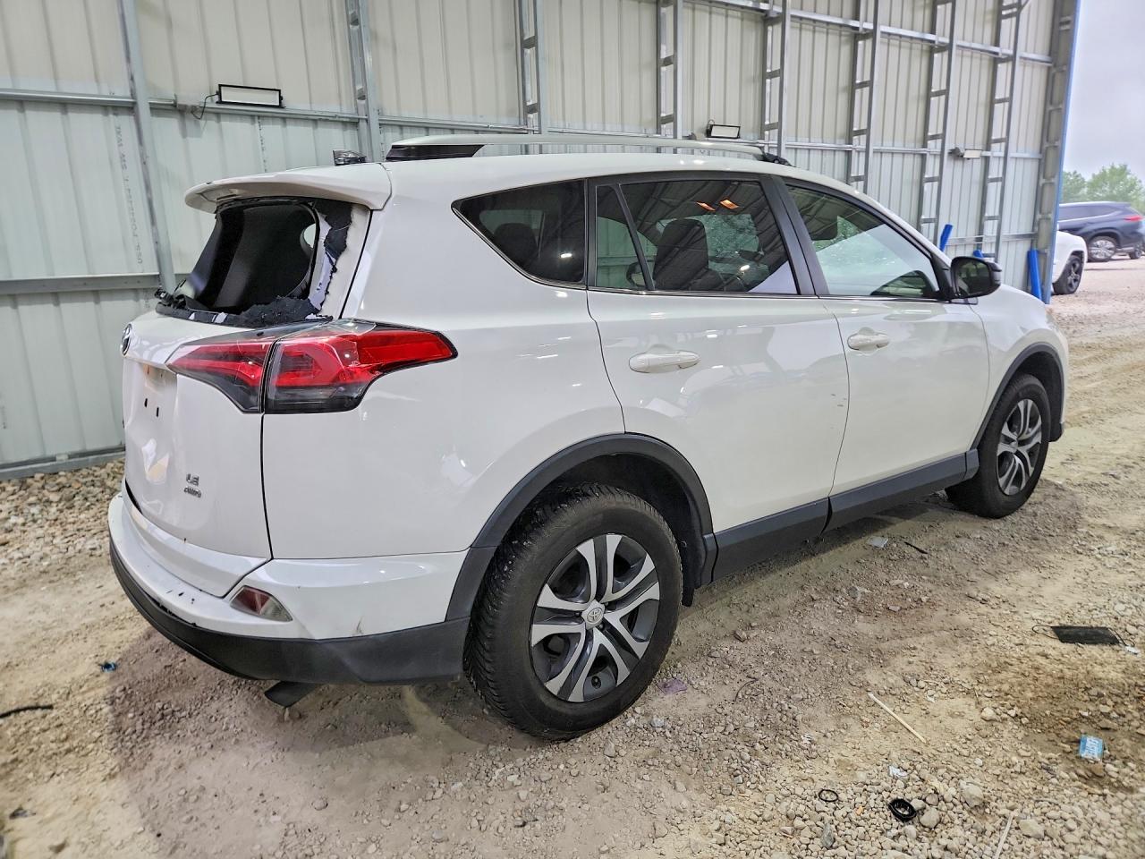 2016 Toyota Rav4 Le White vin: JTMBFREV5GD190297