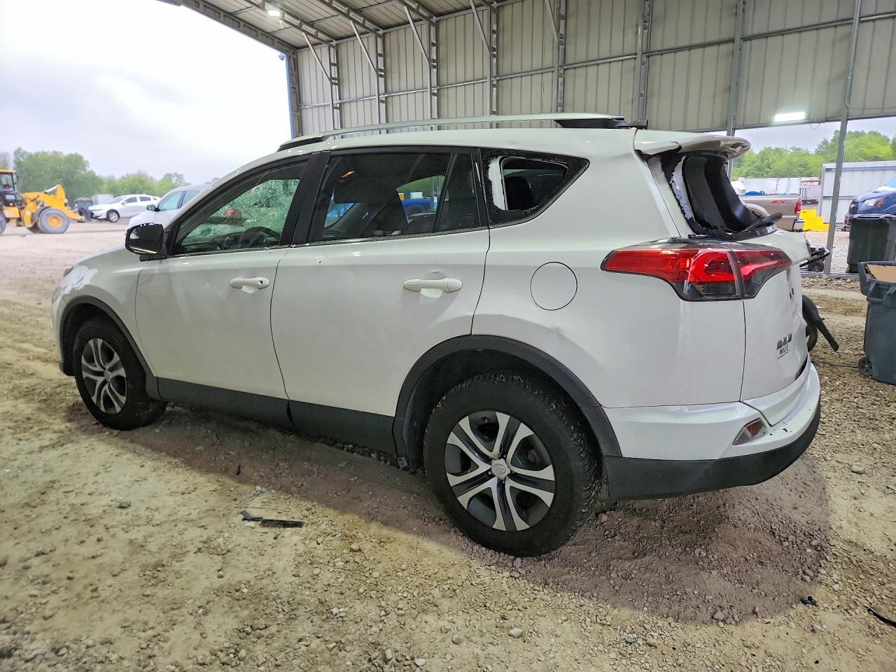 2016 Toyota Rav4 Le White vin: JTMBFREV5GD190297