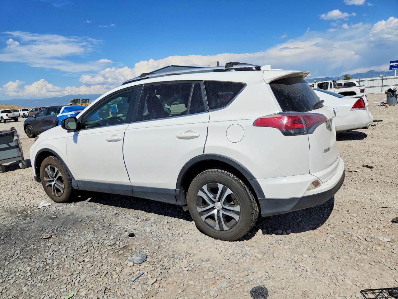 2016 Toyota Rav4 Le White vin: JTMBFREV7GD192178