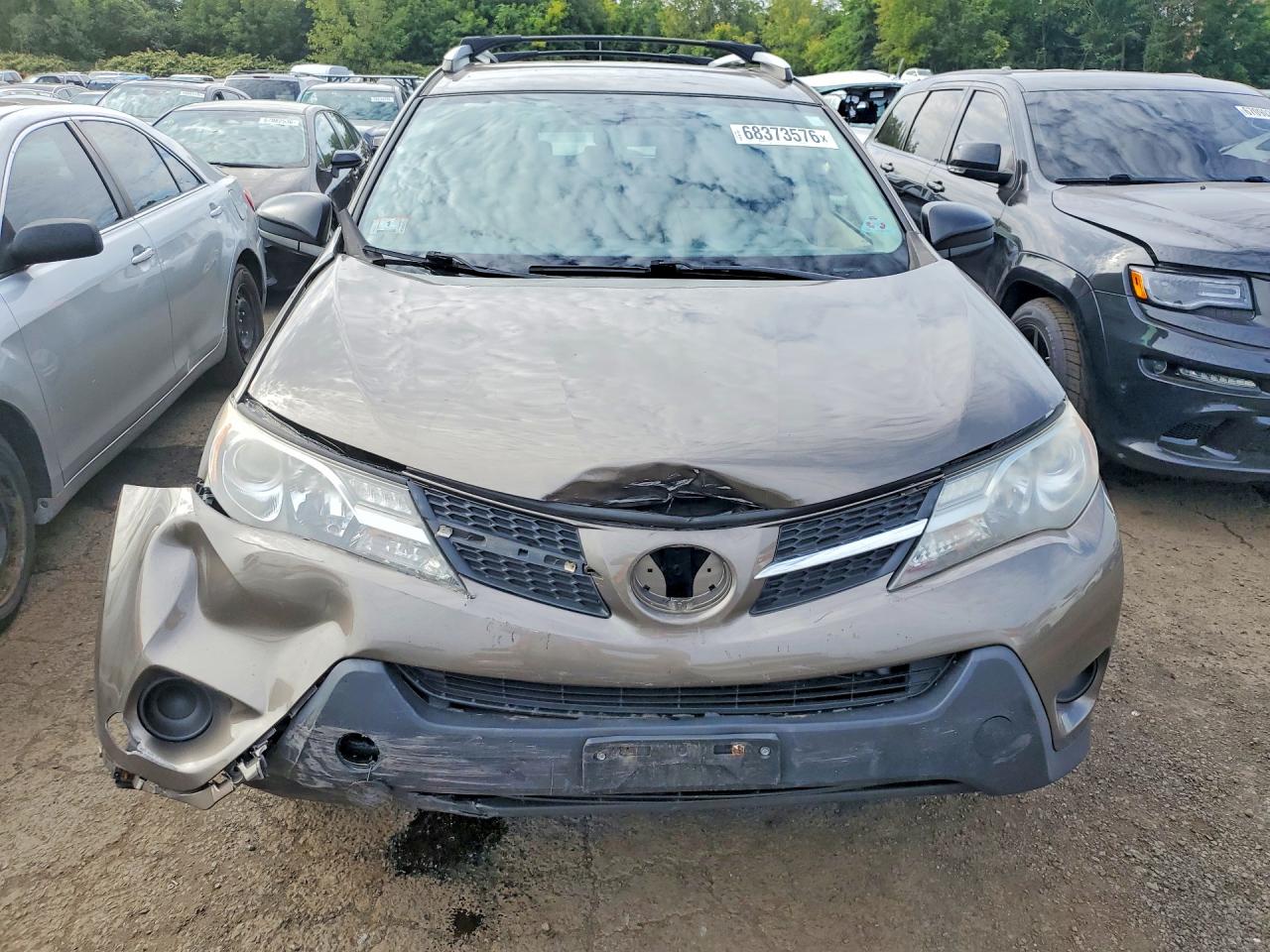 2013 Toyota Rav4 Le Brown vin: JTMBFREV8D5010137