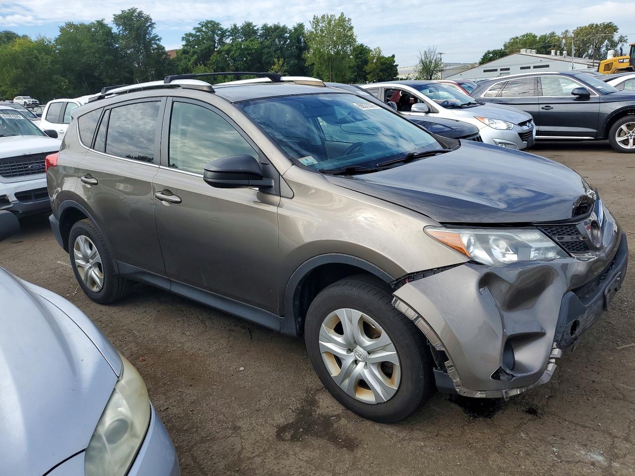 2013 Toyota Rav4 Le Brown vin: JTMBFREV8D5010137
