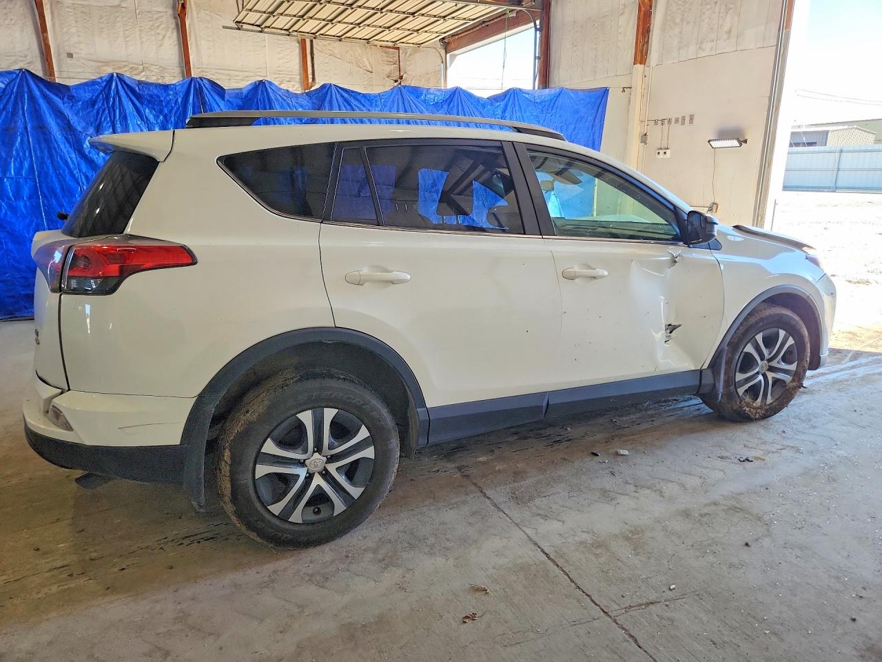 2017 Toyota Rav4 Le White vin: JTMBFREV8HJ104810