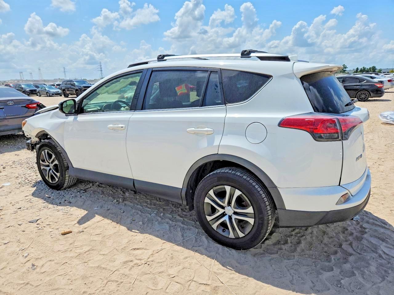 2018 Toyota Rav4 Le White vin: JTMBFREVXJD246323