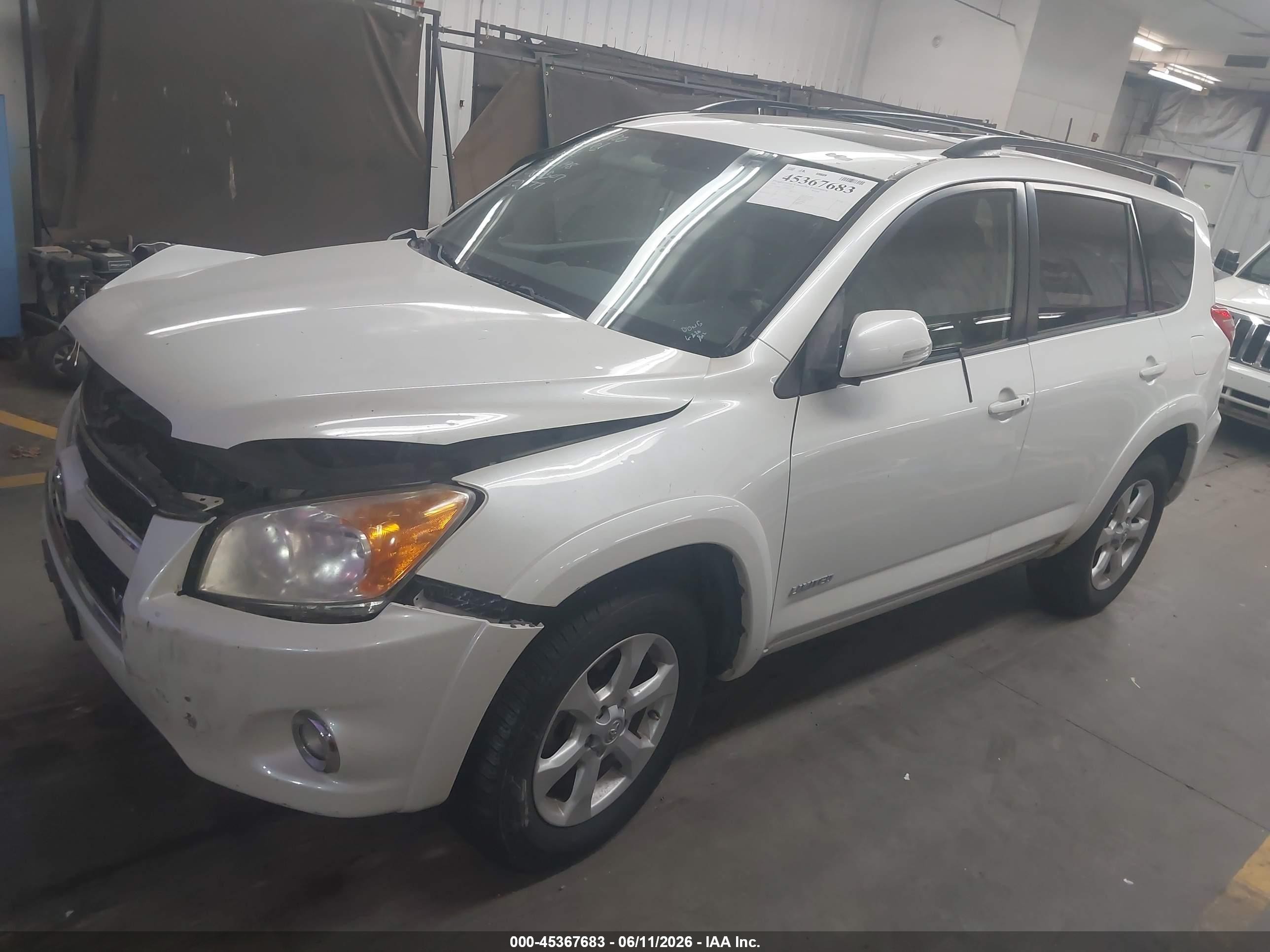 2009 Toyota Rav4 Limited V6 White vin: JTMBK31V595080507