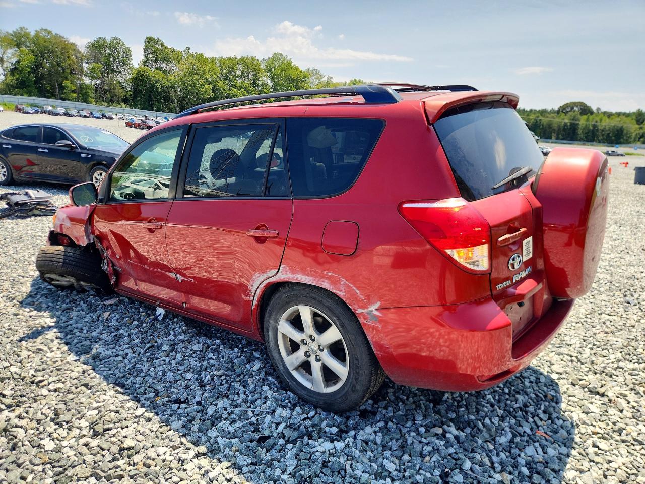 2007 Toyota Rav4 Limited Red vin: JTMBK31V776013382