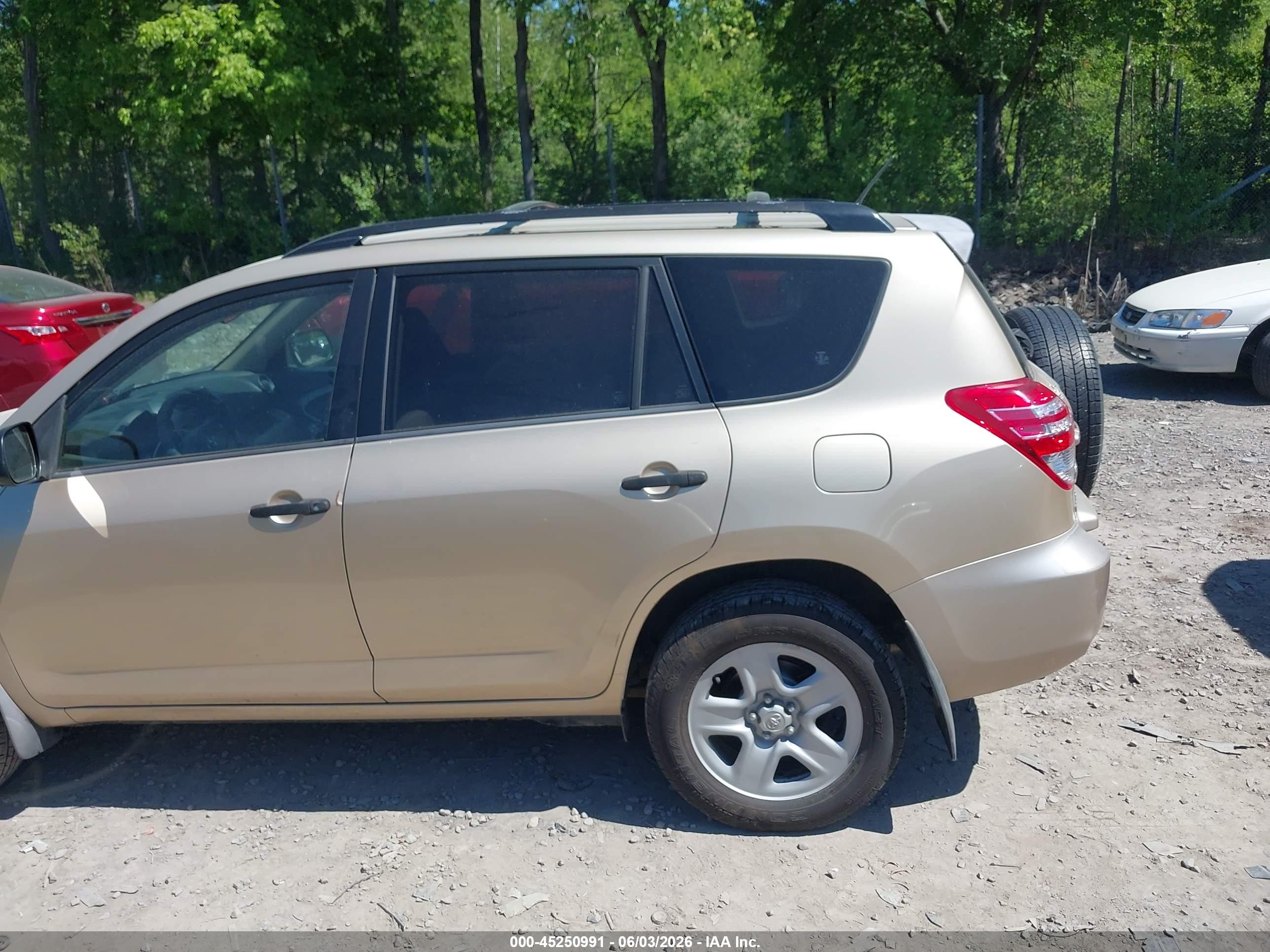 2009 Toyota Rav4 Base V6 Желто-коричневый vin: JTMBK33V695073594