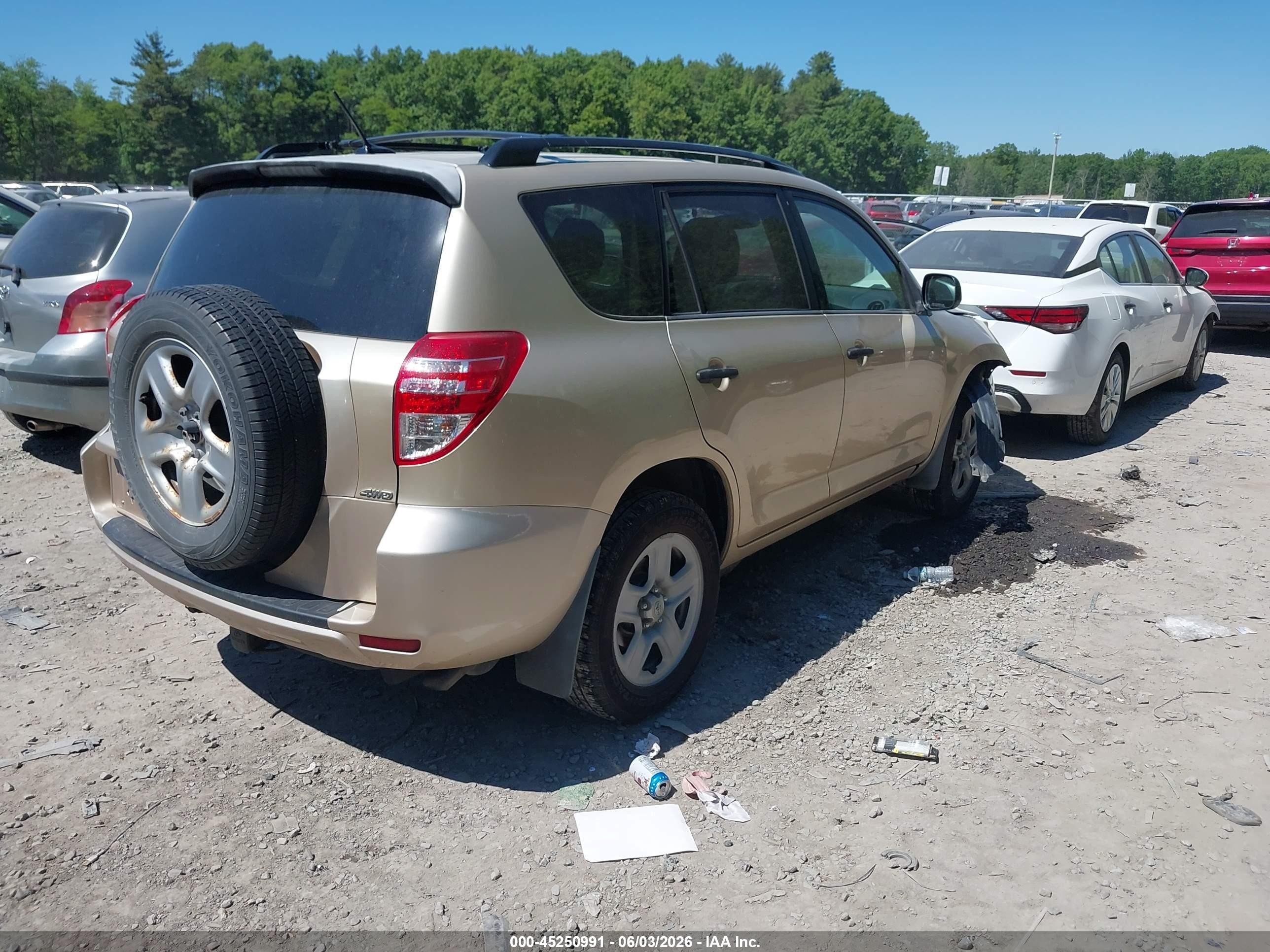2009 Toyota Rav4 Base V6 Желто-коричневый vin: JTMBK33V695073594