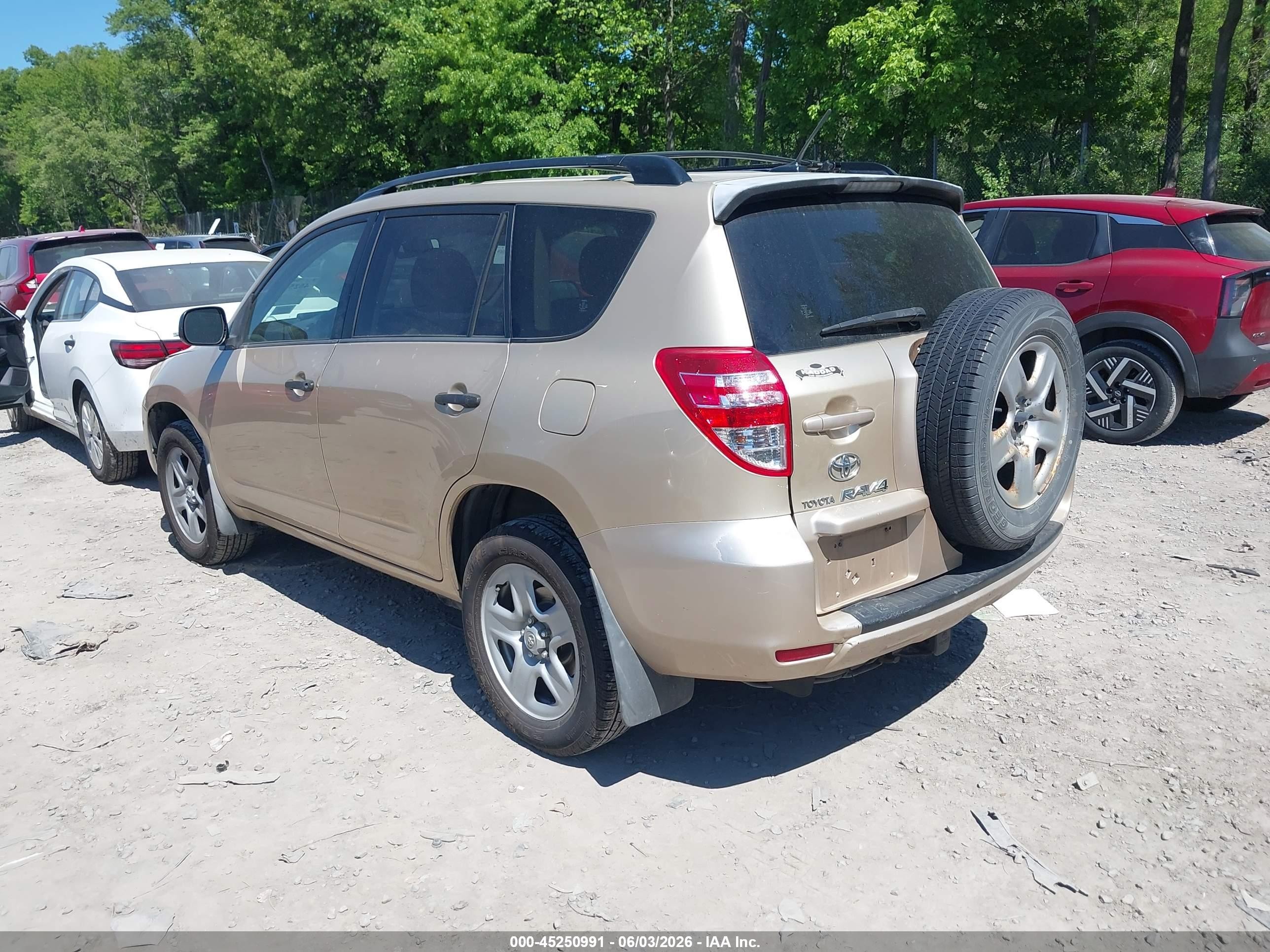 2009 Toyota Rav4 Base V6 Желто-коричневый vin: JTMBK33V695073594