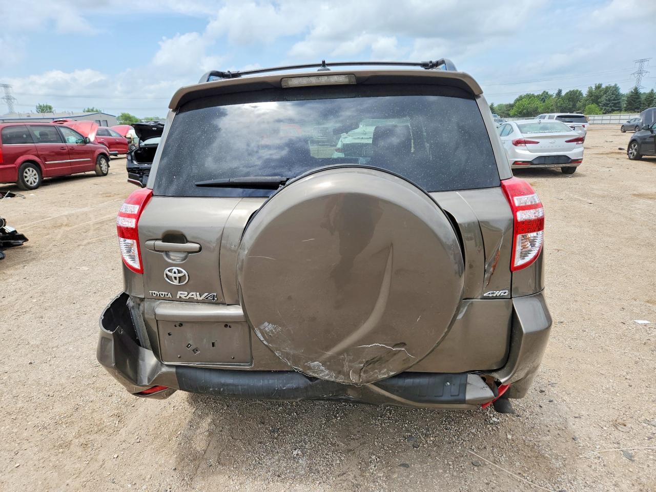 2009 Toyota Rav4 Base Brown vin: JTMBK35V295075680