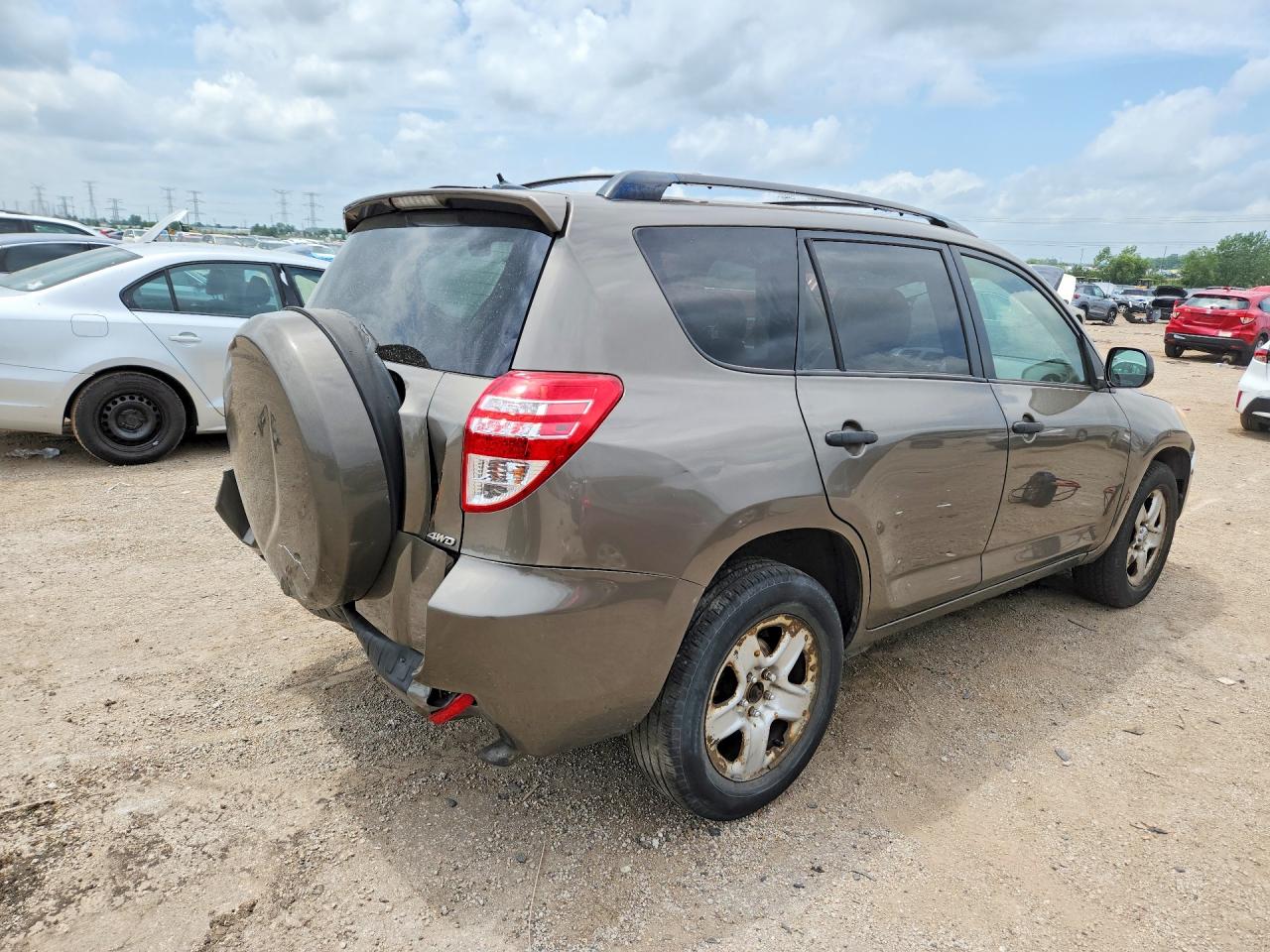 2009 Toyota Rav4 Base Brown vin: JTMBK35V295075680
