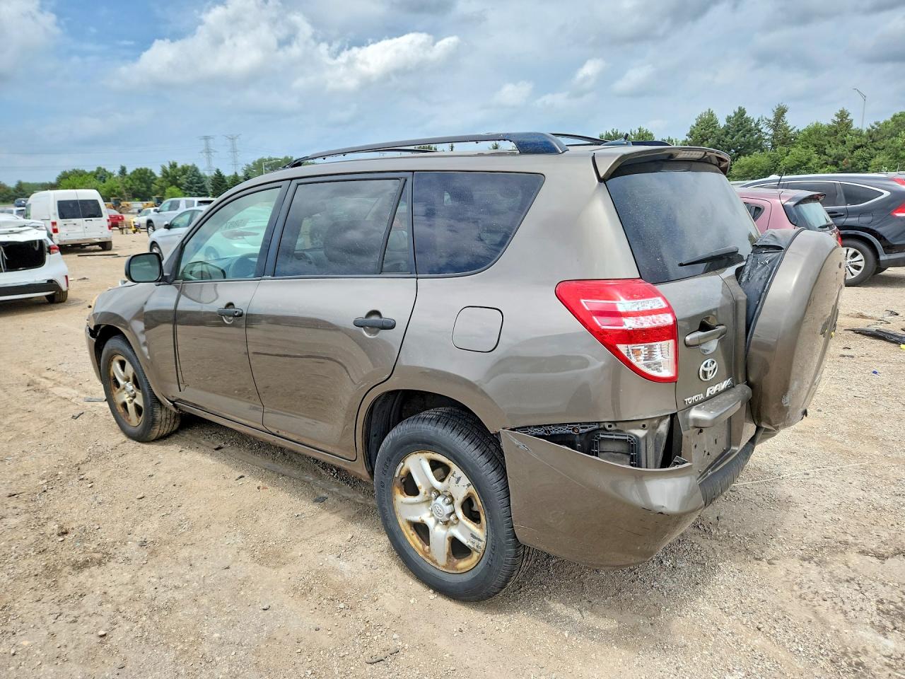 2009 Toyota Rav4 Base Brown vin: JTMBK35V295075680