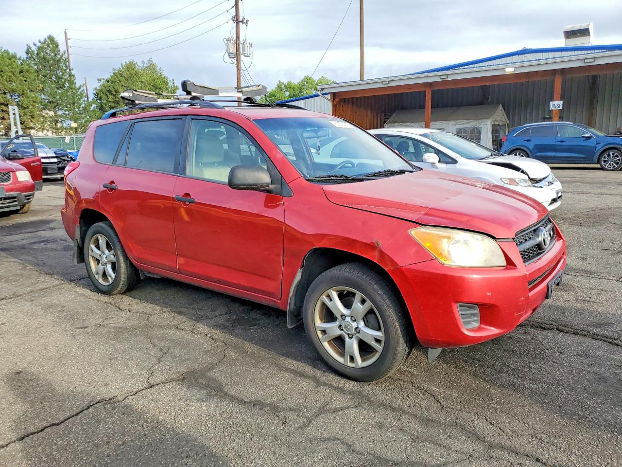 2009 Toyota Rav4 Base Red vin: JTMBK35V895073559