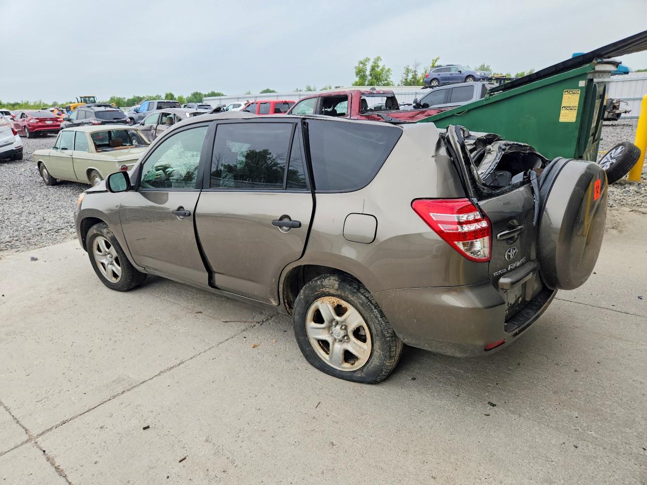2010 Toyota Rav4 Base Gold vin: JTMBK4DV9AD012738
