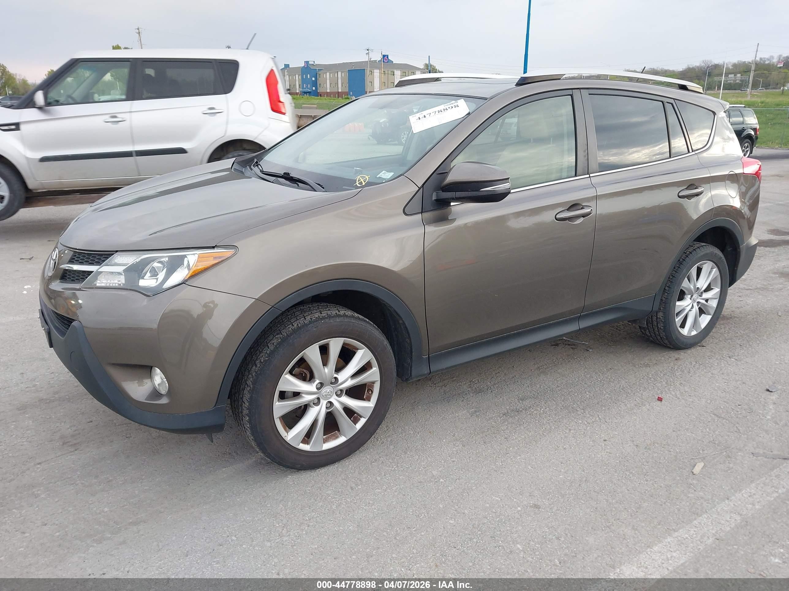 2015 Toyota Rav4 Limited Tan vin: JTMDFREV3FD168595