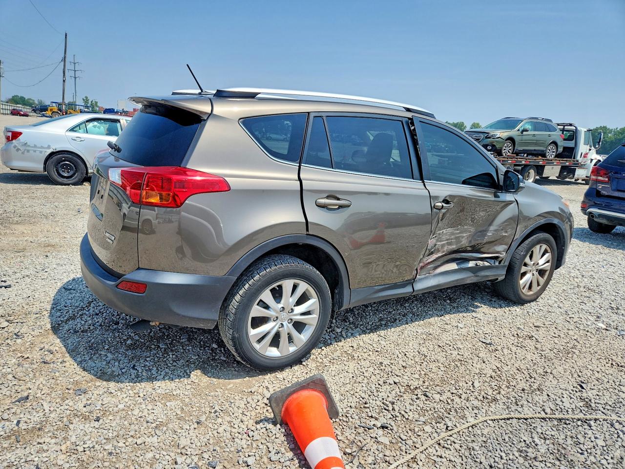 2015 Toyota Rav4 Limited Gold vin: JTMDFREV4FD164197