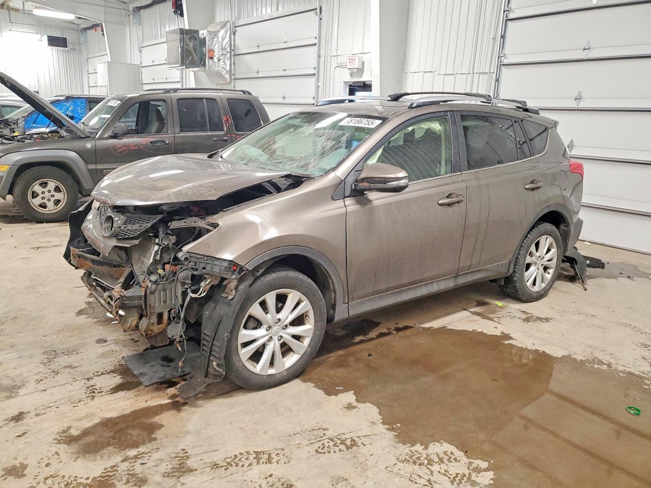 2014 Toyota Rav4 Limited Brown vin: JTMDFREV6ED087654