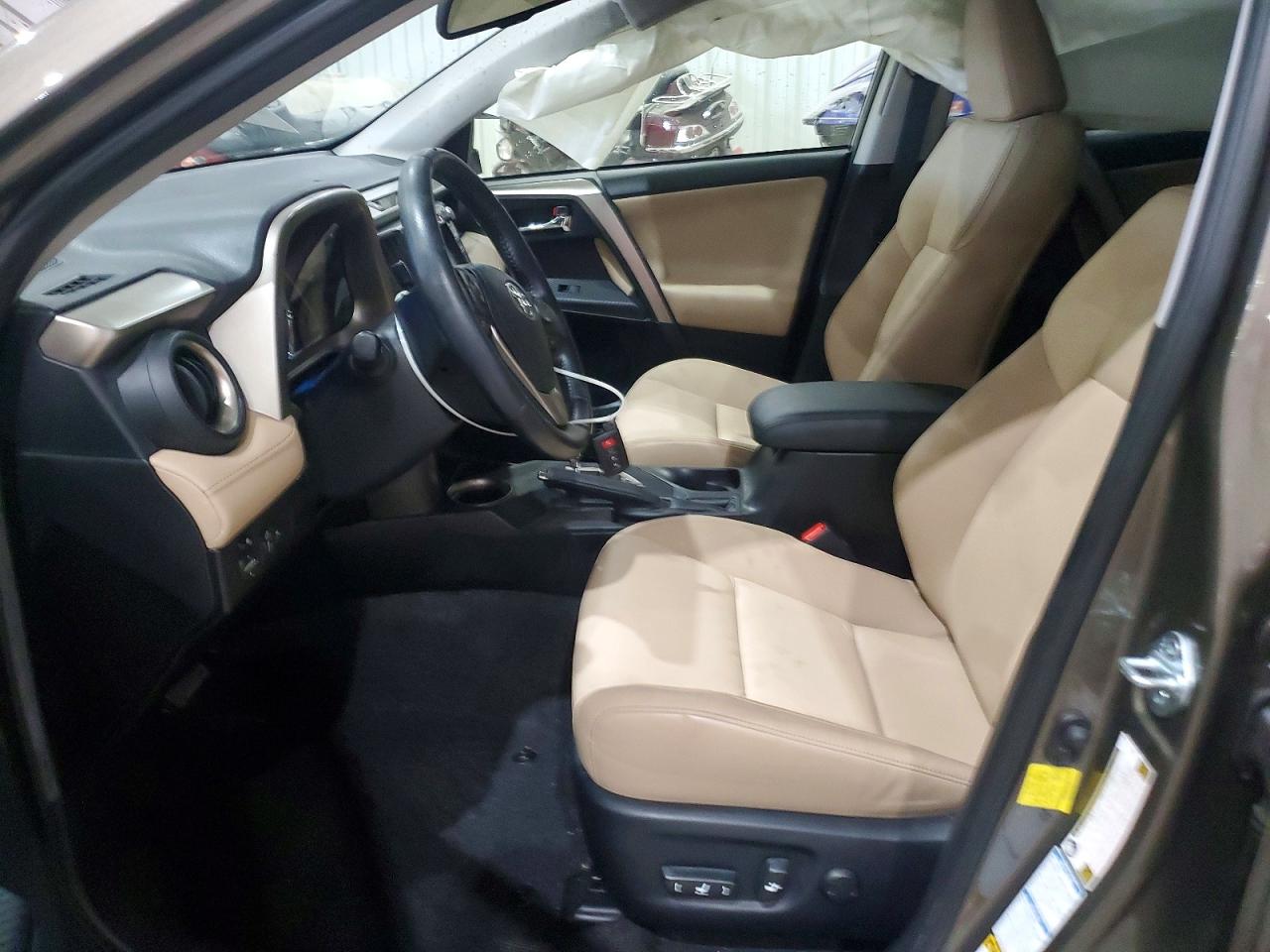2015 Toyota Rav4 Limited Tan vin: JTMDFREV6FD135834