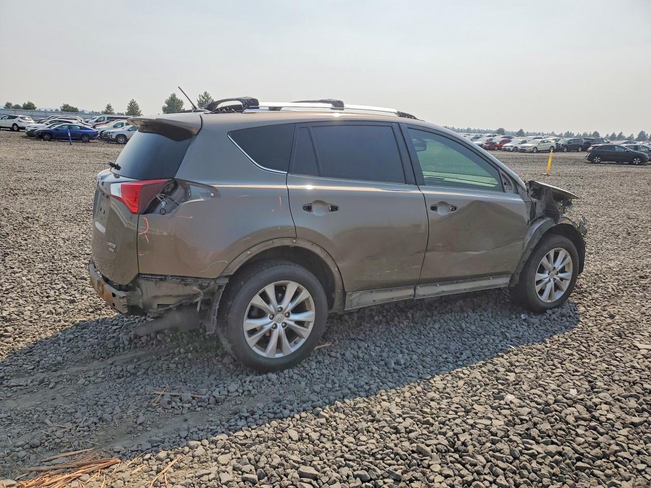 2015 Toyota Rav4 Limited Tan vin: JTMDFREV7FD160192