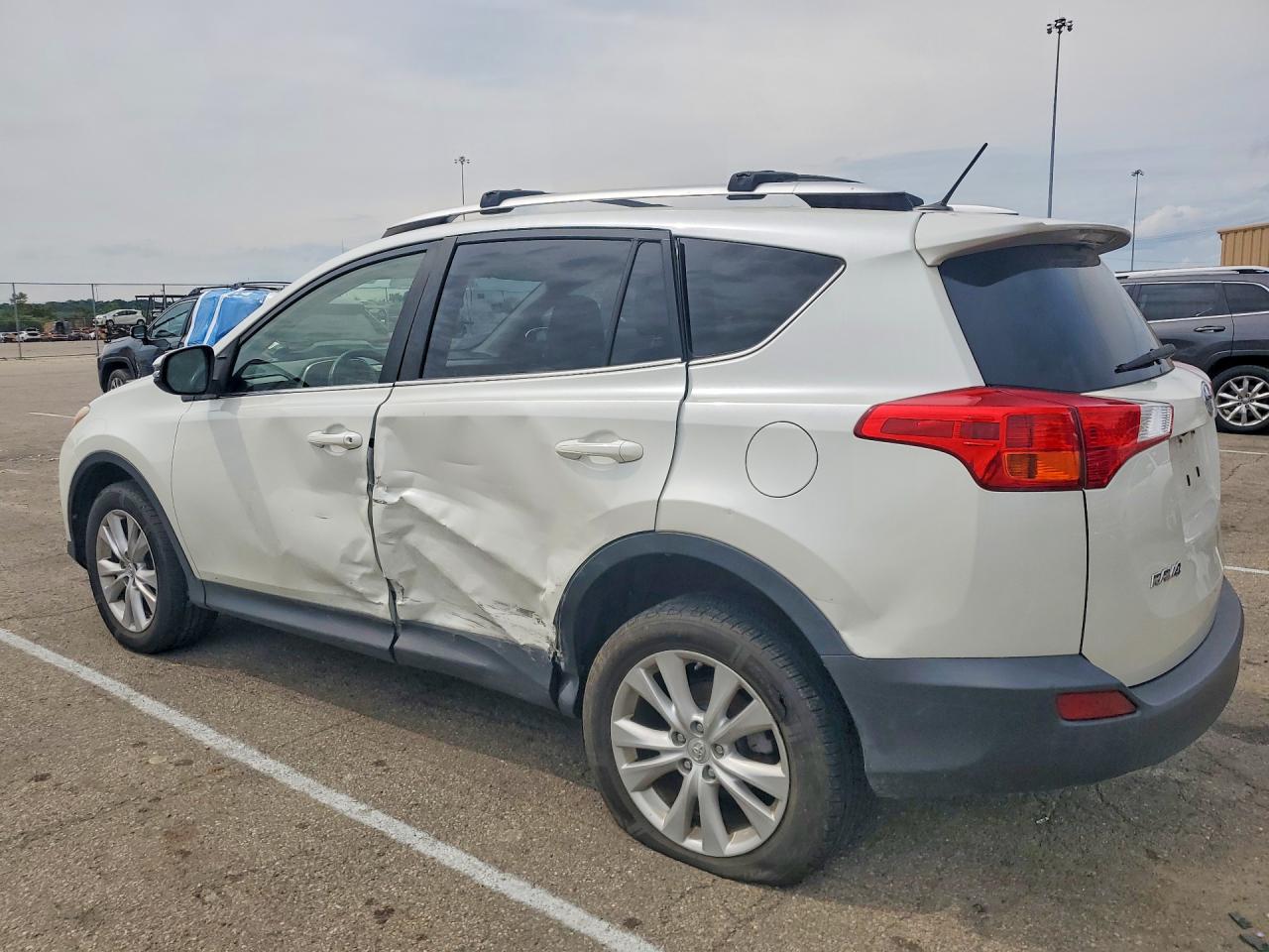 2014 Toyota Rav4 Limited White vin: JTMDFREV8ED075554