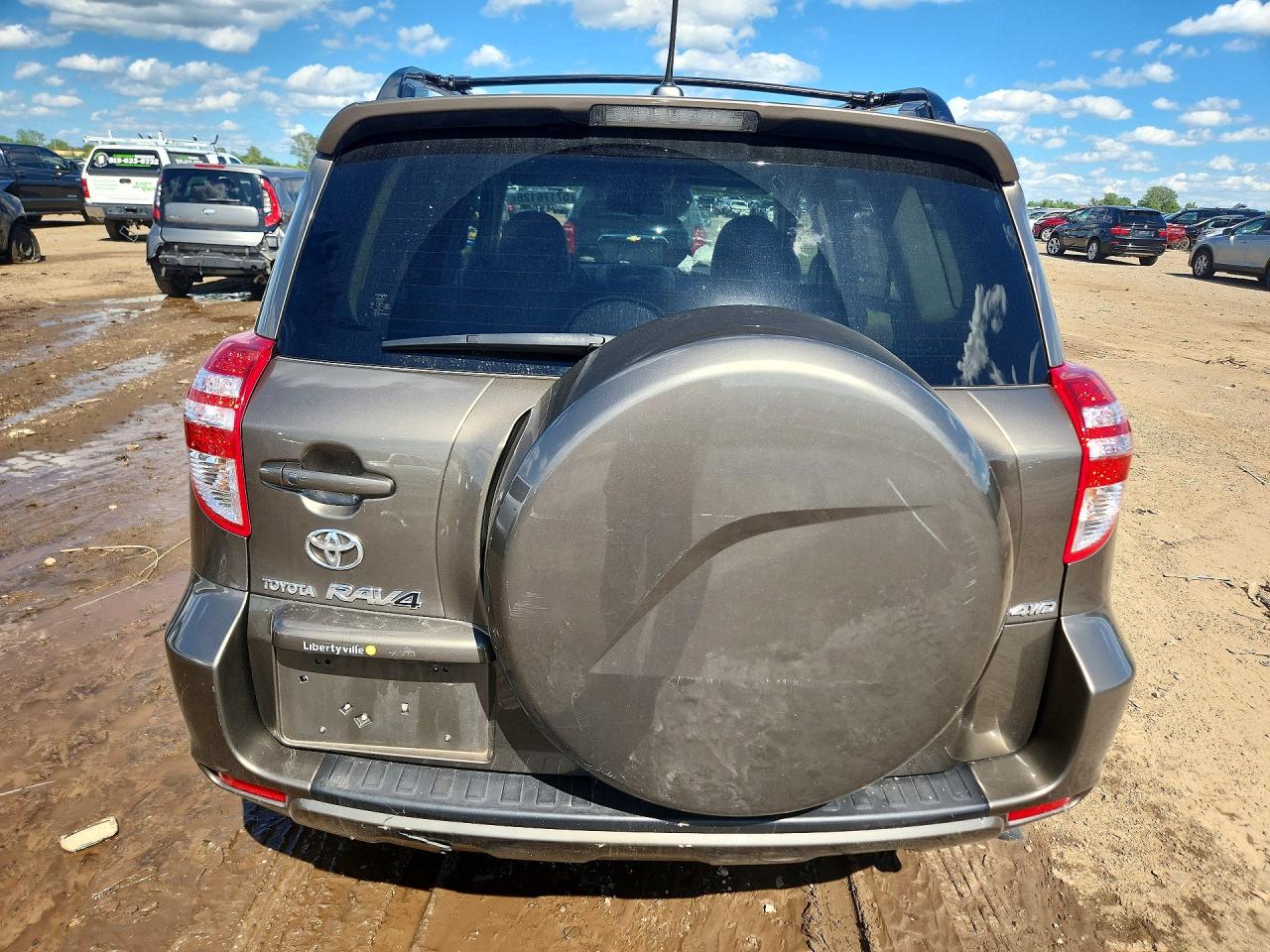 2010 Toyota Rav4 Limited Tan vin: JTMDK4DV6AD012429