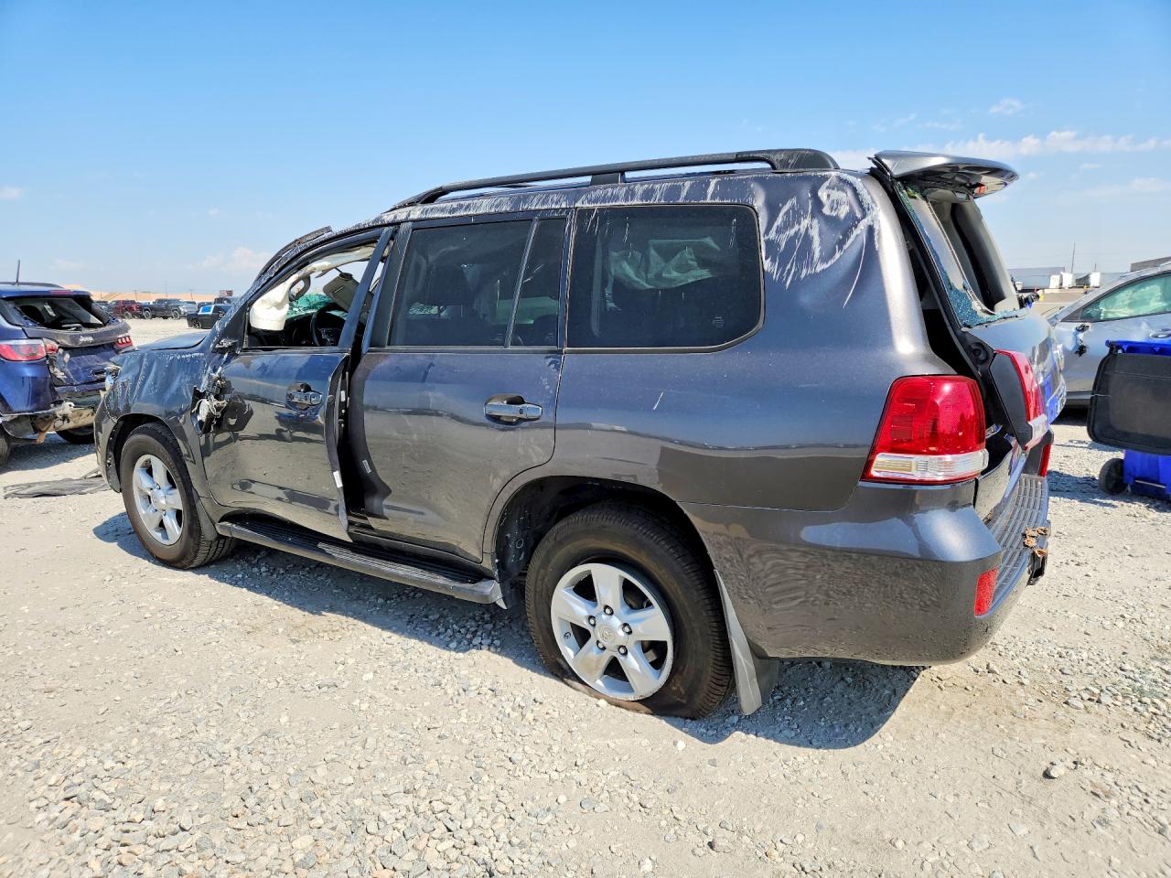 2009 Toyota Land Cruiser Base Gray vin: JTMHY05JX94002633