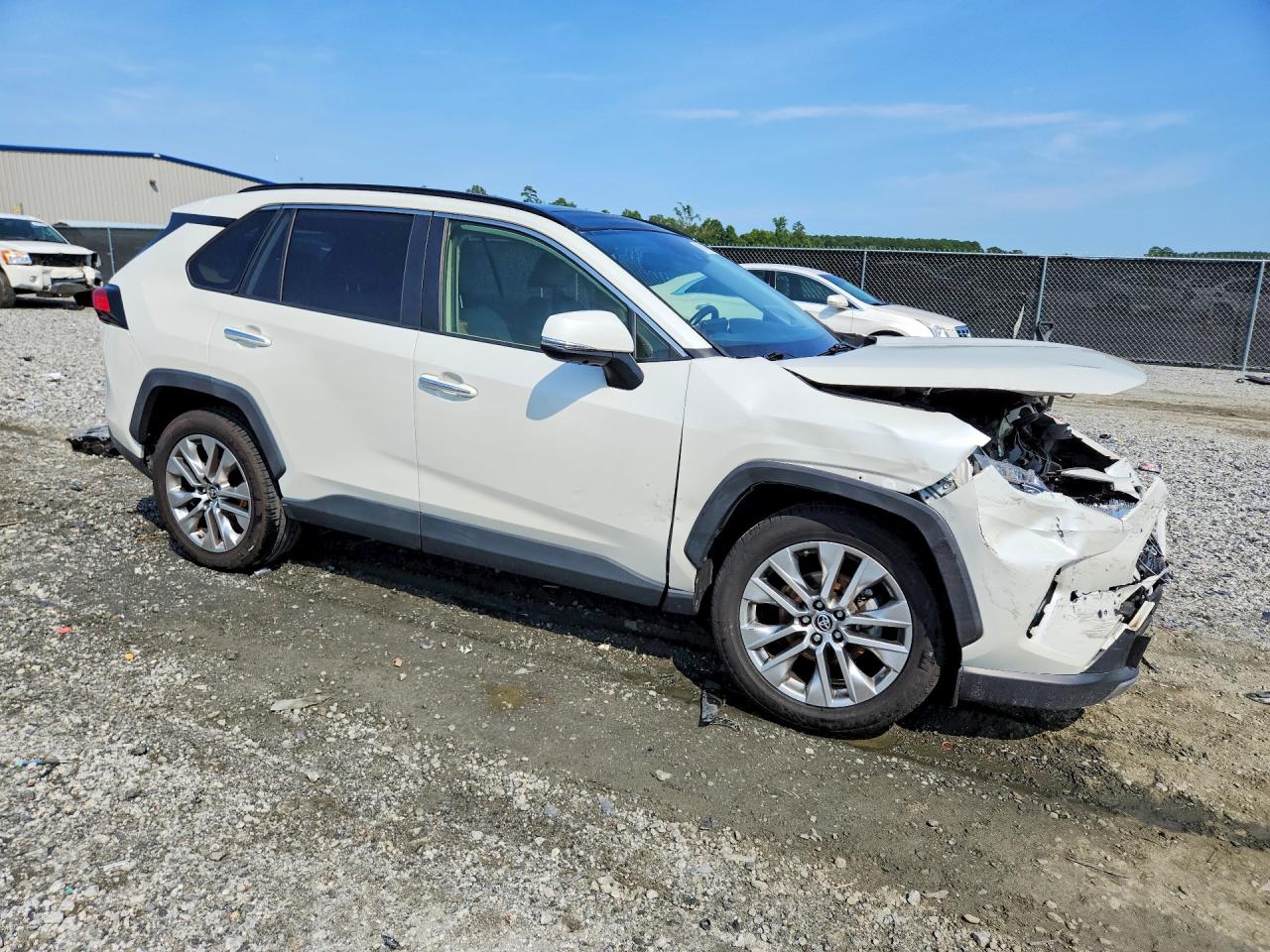 2019 Toyota Rav4 Limited White vin: JTMN1RFVXKD523838