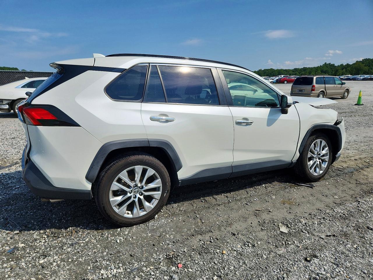 2019 Toyota Rav4 Limited White vin: JTMN1RFVXKD523838