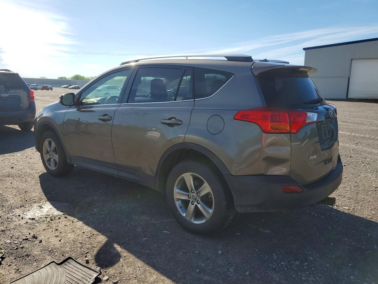 2015 Toyota Rav4 Xle Желто-коричневый vin: JTMRFREV1FD157844