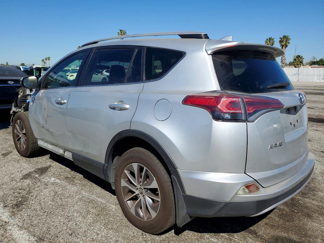 2016 Toyota Rav4 Hybrid Xle Silver vin: JTMRJREV7GD005633