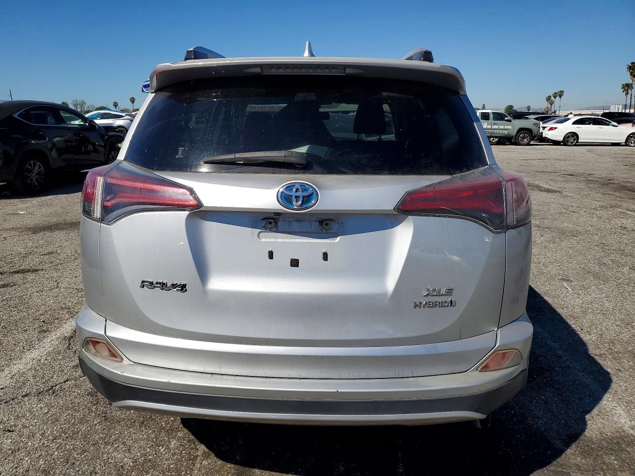 2016 Toyota Rav4 Hybrid Xle Silver vin: JTMRJREV7GD005633