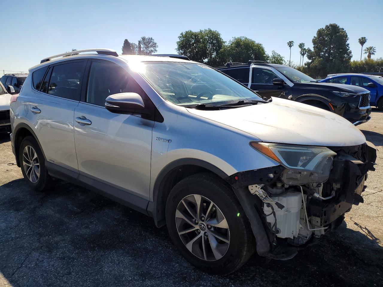 2016 Toyota Rav4 Hybrid Xle Silver vin: JTMRJREV7GD005633