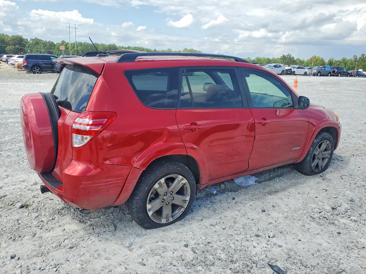 2010 Toyota Rav4 Sport Red vin: JTMWF4DV7AD021699