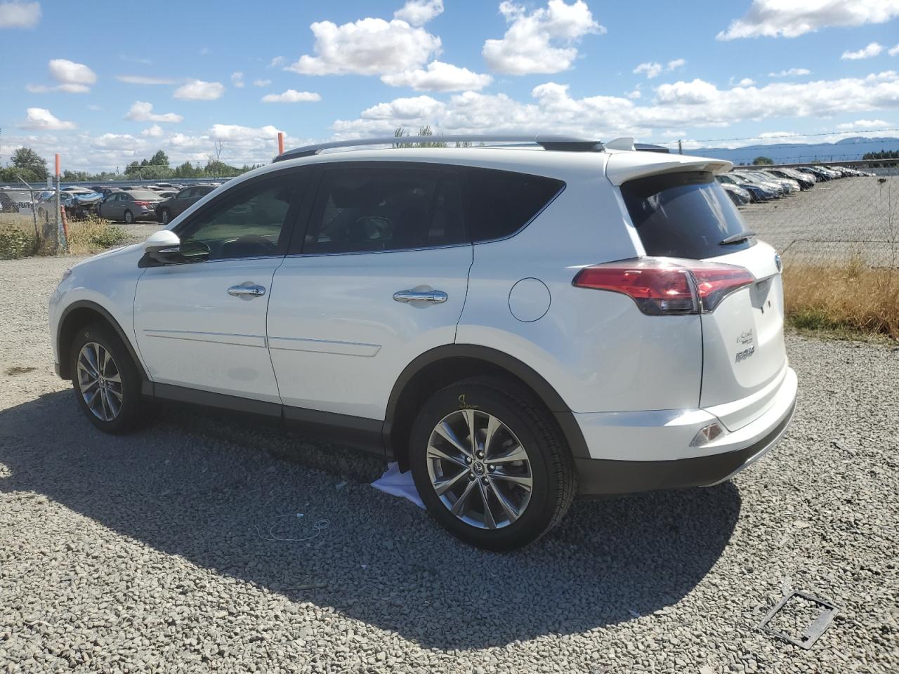 2018 Toyota Rav4 Limited White vin: JTMYFREV1JJ193104