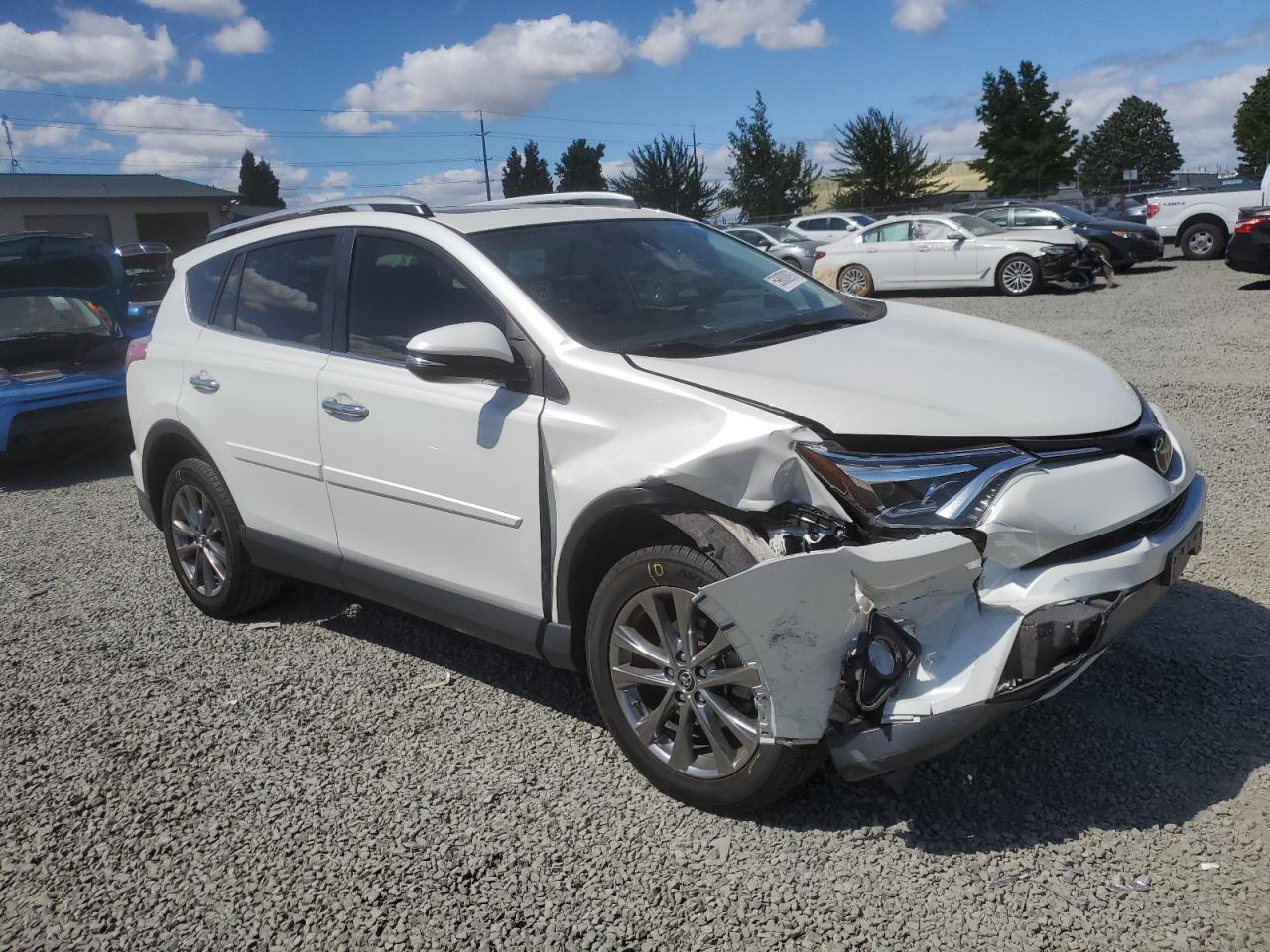 2018 Toyota Rav4 Limited White vin: JTMYFREV1JJ193104