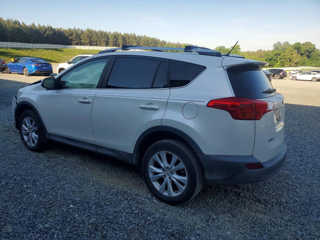 2014 Toyota Rav4 Limited White vin: JTMYFREV6EJ023410