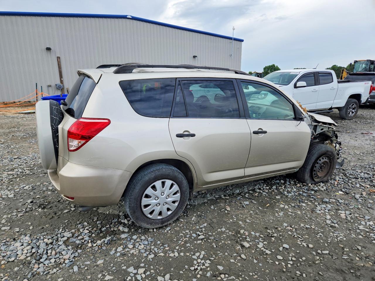 2007 Toyota Rav4 Base Gold vin: JTMZD33V676037064